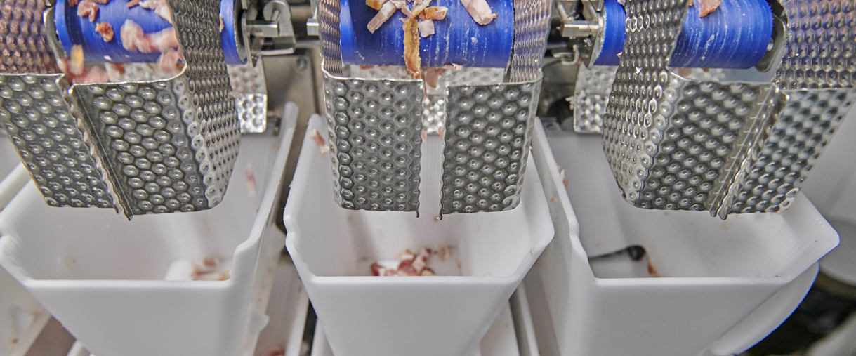 SBV Lardons Fall Into Hoppers (Remove Skin On Middle Blue Belt) (PR Shot)