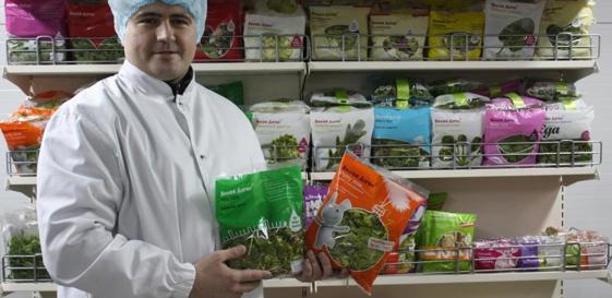Belaya Dacha Customer With Product Samples (PR Shot)
